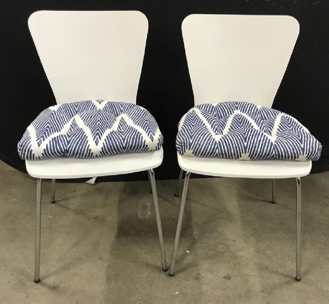 Pr White Retro Chrome Dining Chairs W Cushions: Pair of white tone wood composite chairs with silver the metal legs. Retro Style, VIntage style, mid century modern style, Arne jacobsen style Elgin style dining chairs, Chairs have removable cushions