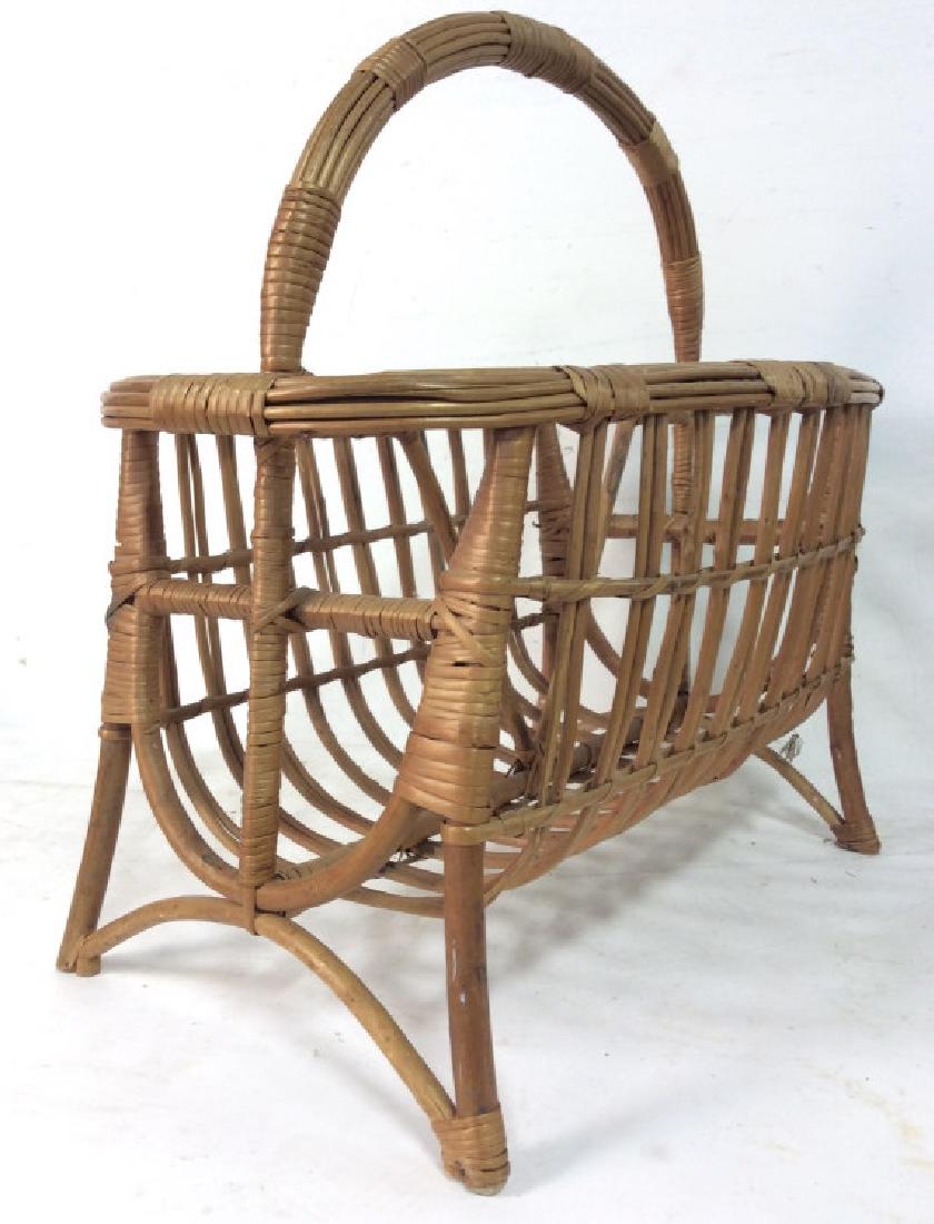 Woven Whicker/Rattan Magazine Holder: Woven Whicker/Rattanbamboo Magazine Holder. Brown toned woven rattan magazine holder with handle and two sections, rustic decor, home accessory, home decor, magazine book holder. Measures approx 20 in