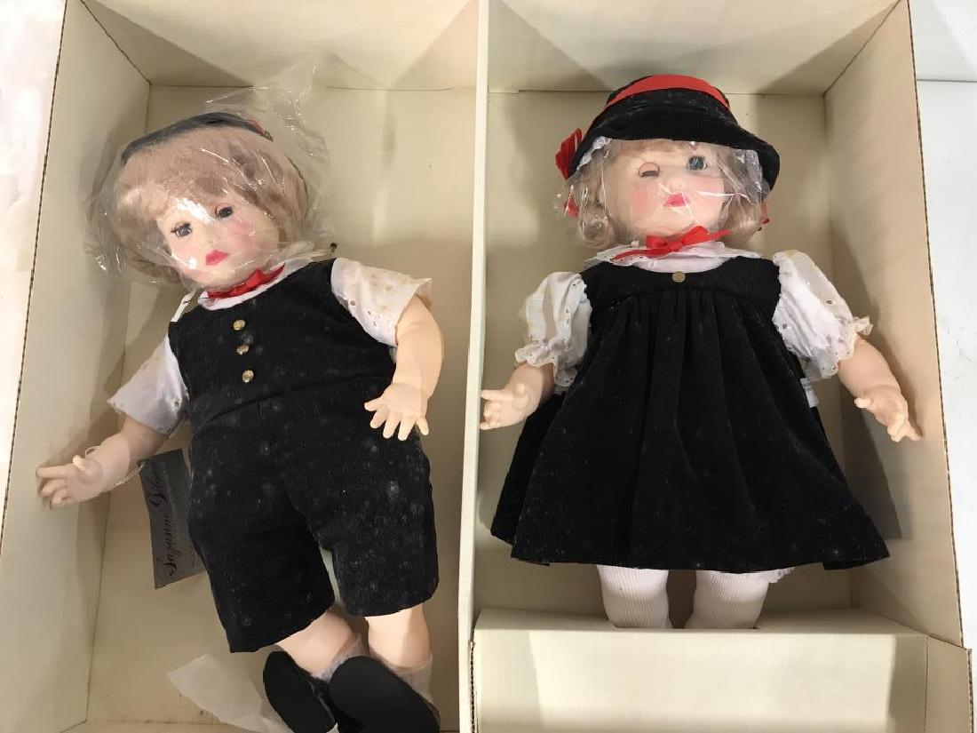 SUZANNE GIBSON Pair Collectible Dolls w Boxes: SUZANNE GIBSON collectible dolls from the Reeves International 1984 Signature Edition Set collection. Two dolls ‘Pauline’ and ‘Paul’. Possibly vinyl or hard plastic. Both Dolls come in a singl