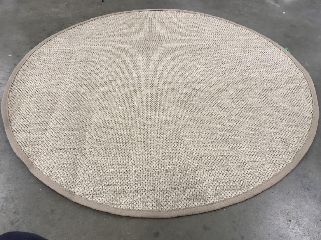 SAFAVIEH Beige Toned Circular Rug Carpet: Tag on on underside reads SAFAVIEH. MEASURES approx 72 inches wide. Piece is beige toned. Contains some wear. Rug carpet, round circle rug, home accessory. 6