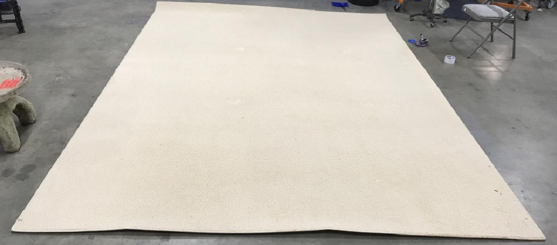 Beige Toned Wool Rug: Beige toned wool rug. Contains some stains and furniture marks. Measures approx 142 inches long 108 inches wide. Rug, carpet, area rug, home accessory, home decor 6