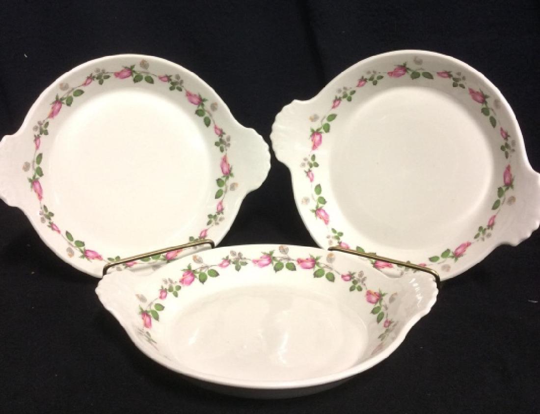 Exclusive Chamant France Plates: Plates read Exclusive Chamart France, hand painted, matching set of 3. Porcelain plates. Tones of white, green, pink and grey. Measures 8.5 inches. wide decorative table top accessory, display plate,