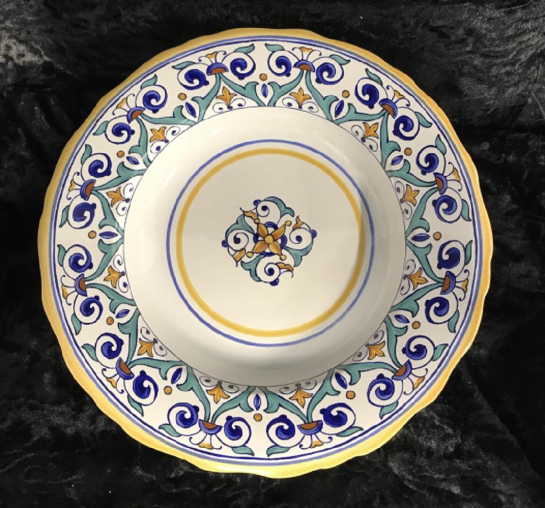 Set 4 WILLIAM-SONOMA Plates Made in Portugal: Group of William Sanoma Dishes. plates, tableware, Dishes have painted yellow, blue, white and green toned floral accents. Group contains 4 Dishes. Measures 10 inches. decorative table top accessory,