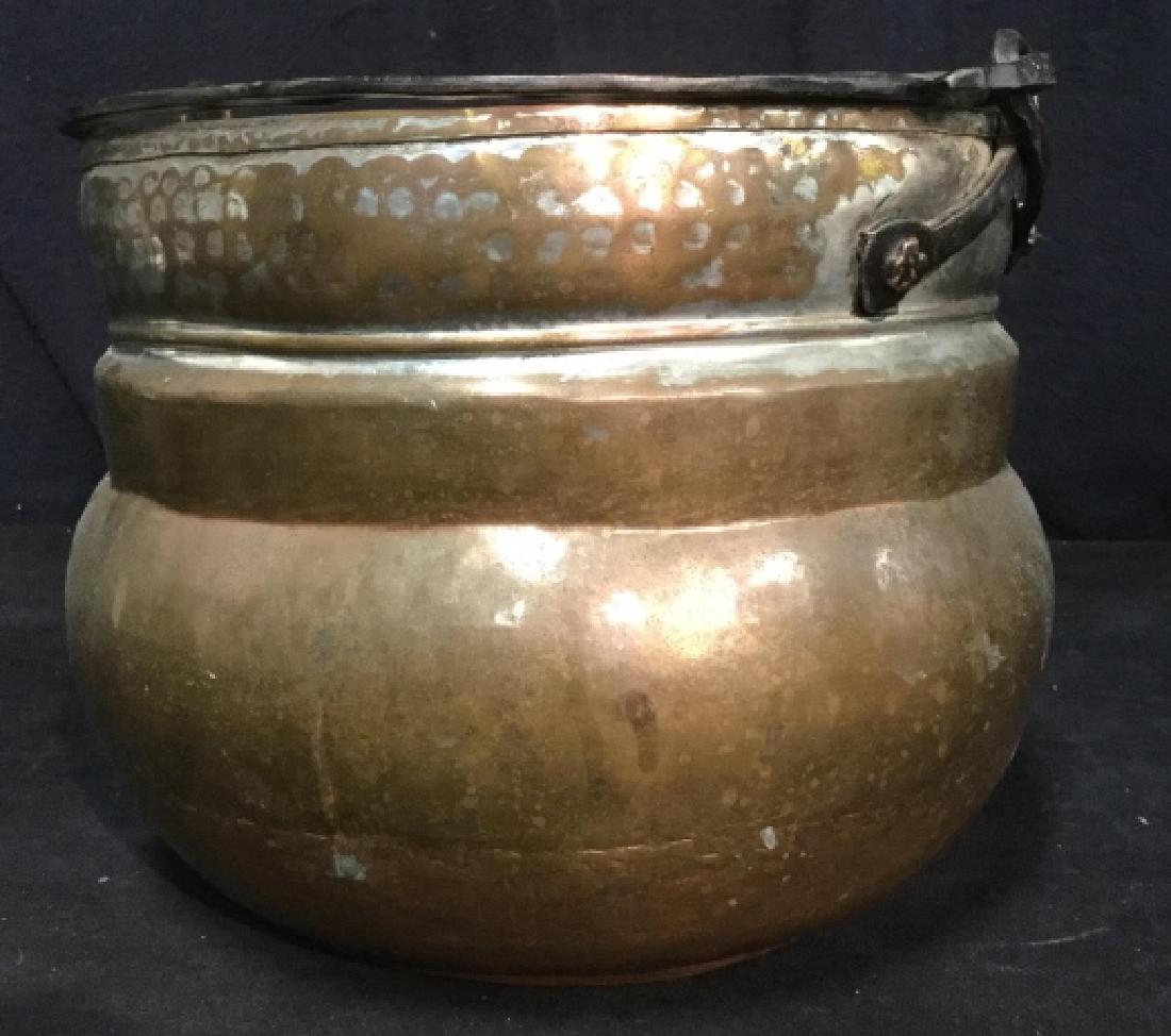 Vintage/Antique Hammered Brass Metal Pot Cauldron: Vintage possibly Antique Metal Pot, possibly copper, Of bulbous Form with Black Metal Handle, 10 in x 9 3/4, 14 1/2 in high to extended handle, good vintage condition, Cauldron,cache pot, planter, dec