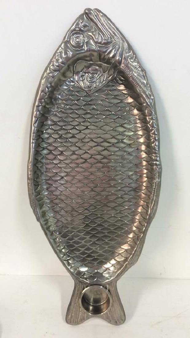 Silver Plated Fish Form Serving Tray: Silver Plated Fish Serving Tray. Repoussé textured fish figural image design with built in dipping tray in tail. Sticker on back reads Silver plate. Measures approx 18 in long by 8 in wide. Home acce