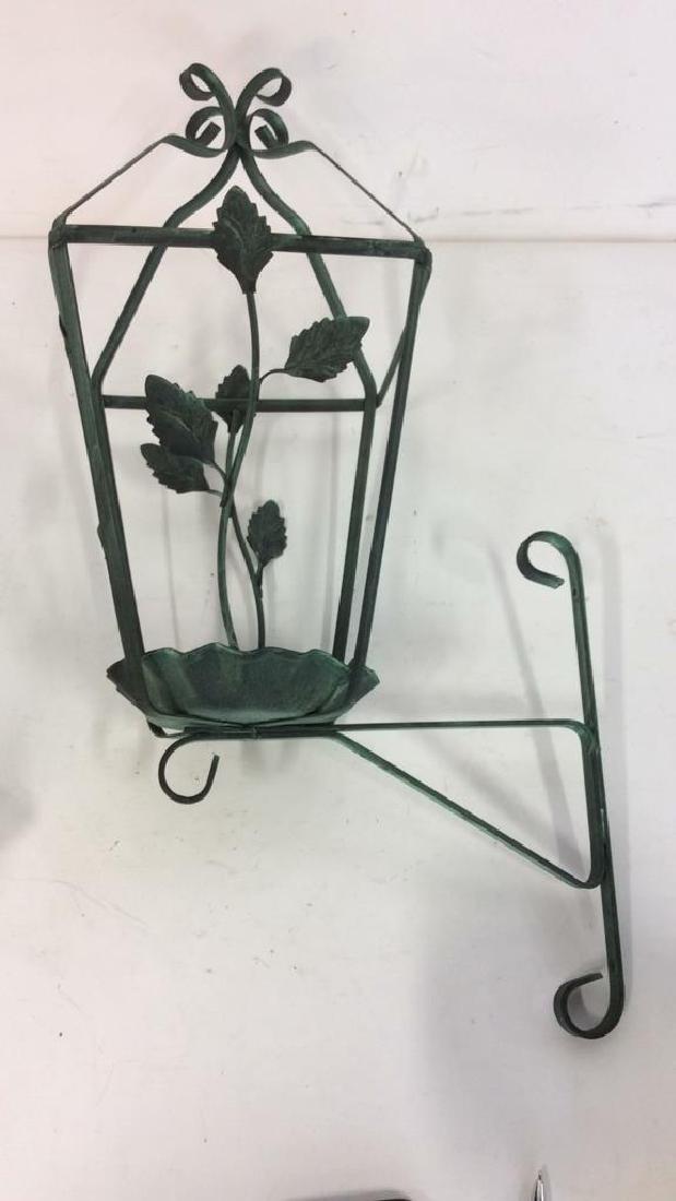 Wall Mounted Patina Metal Lantern: Wall Mounted Patina Metal Lantern style candleholder. Green toned patina metal, lantern style with raised and dimensional leaf vine details. VIntage Metal possibly antique,wall mount metal acessory, M