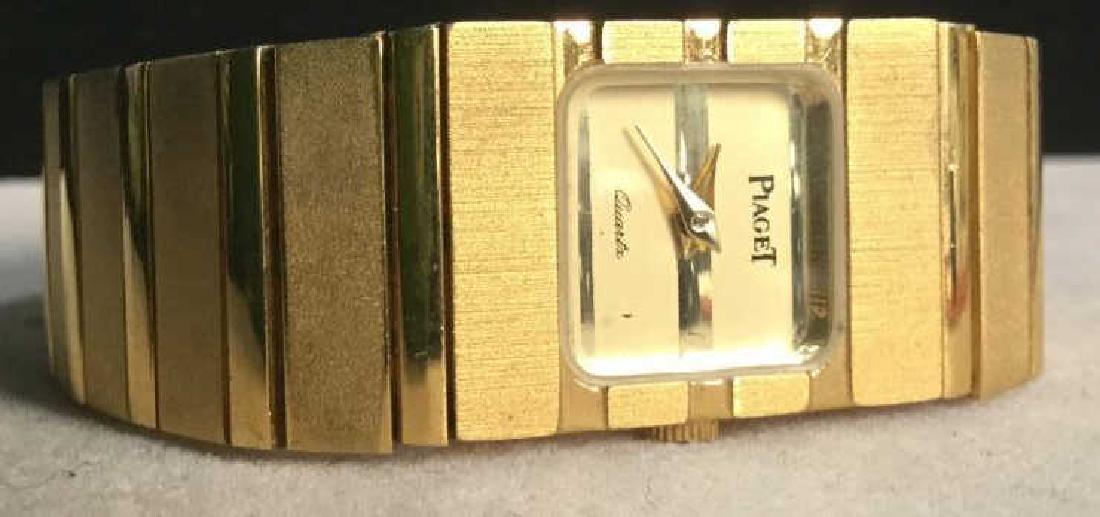 Gold Tone PIAGET Polo Wristwatch: Women’s Men’s Gold Tone PIAGET polo wristwatch. Jewelry bracelet Wristwatch. Reads ‘Piaget Quartz’ on Clock face. Hong Kong engraved on End clasp. Length of Wristwatch unclasped is Approximate