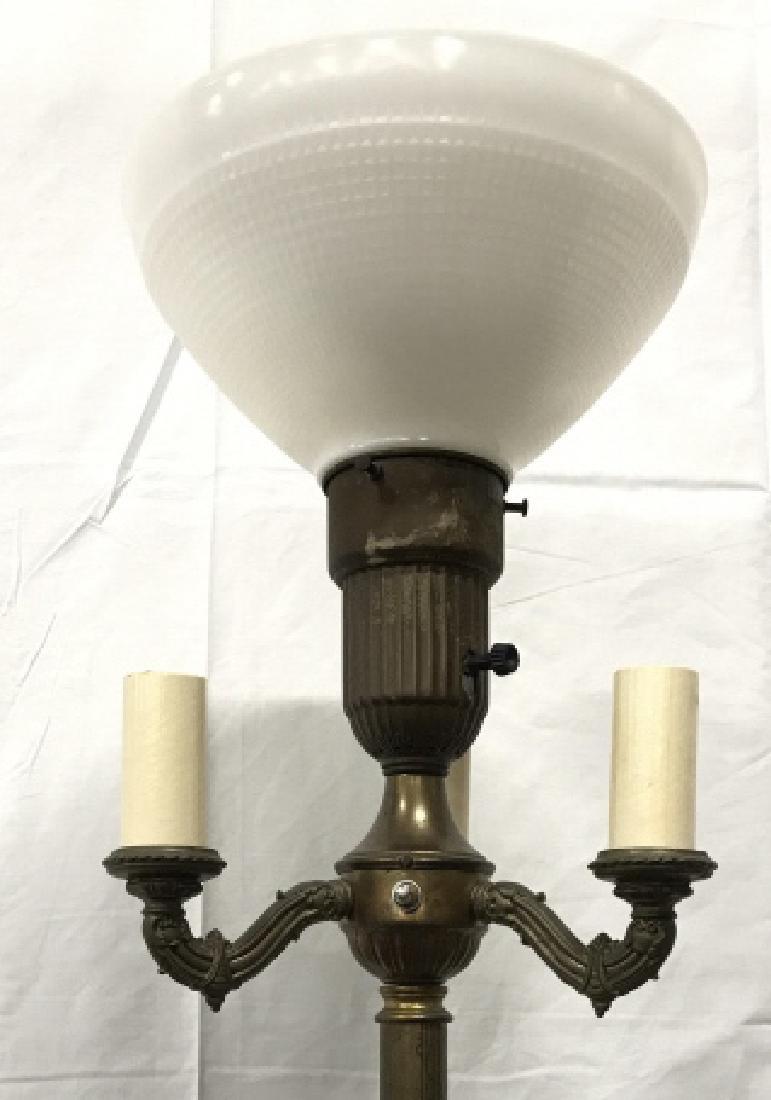 Vintage Poss Antique Brass Toned Torchiere Lamp: Vintage Poss Antique Brass Toned Torchiere Floor Lamp with center milk glass shade, three lower candelabra style arms with intricate scroll design and leaf design on base. Pitting and wear to metal. N