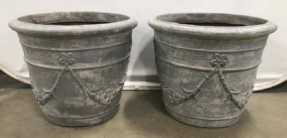 Pair Of Large Grey Composite Resin Planters: Pair Of Large Grey Toned Composite Resin Planters with garland motif, measures approximately 20 inches in height x 24 inches in diameter, need cleaning. Property of a Greenwhich, CT and Palm Beach, FL