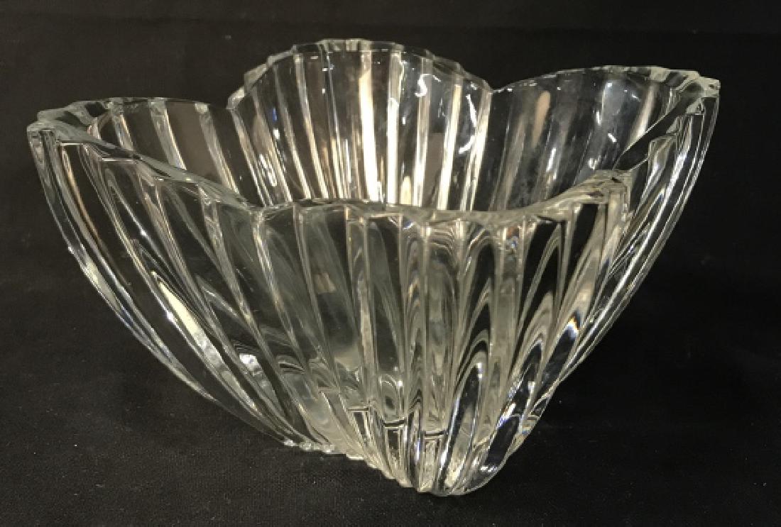 Ribbed Glass Bowl / Vessel: Rubbed glass bowl / vase / vessel, possibly Crystal. Missing three of its pads on underside. Approx 3.75 inches in height by 5.5 inches squared in length and width. Glassware / decorative tabletop acc
