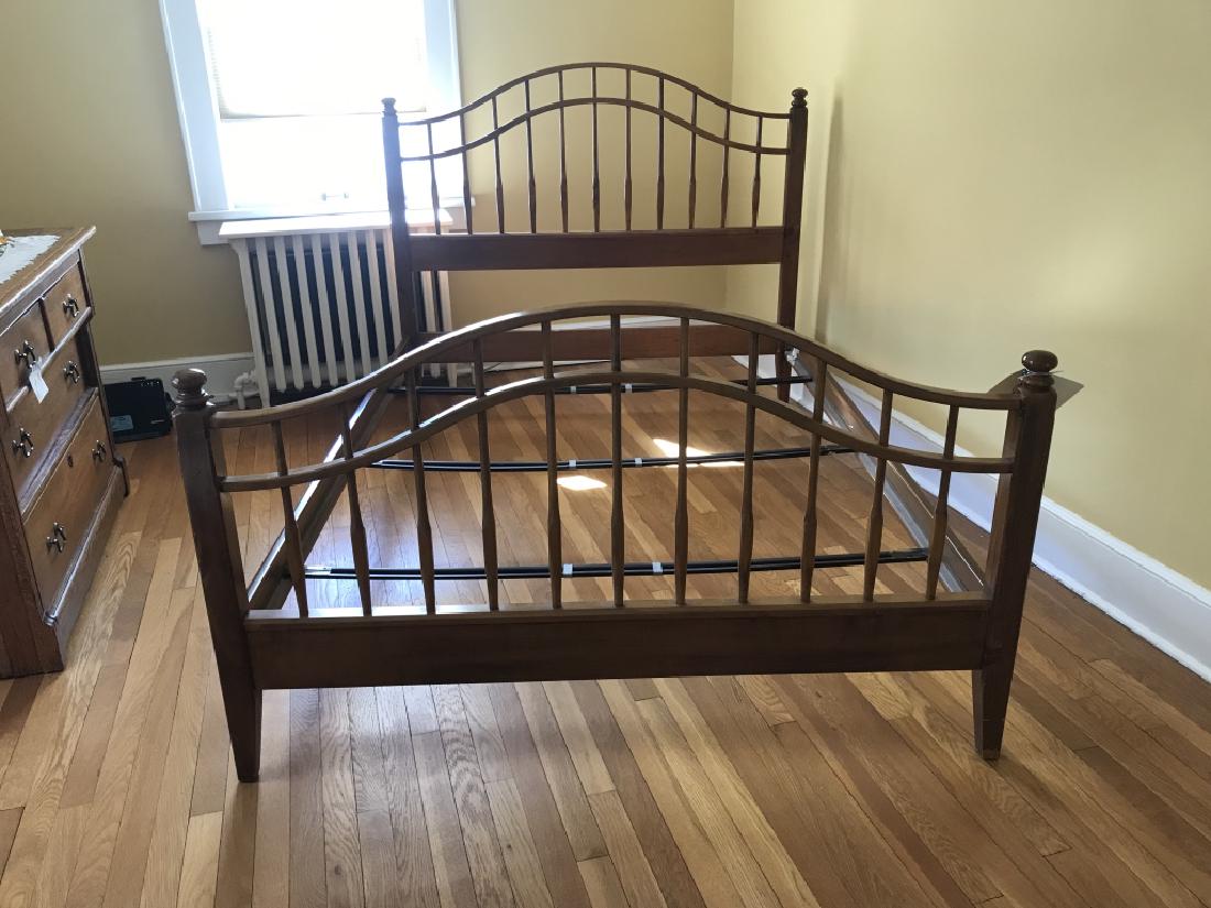 ETHAN ALLEN Oak Toned Wooden Bed: ETHAN ALLEN Oak Toned Wooden Bed Includes Head and footboard, possibly full/queen, measures approximately 56 inches wide x 48 inches tall, marked Ethan Allen on frame, good condition minor marks to Be