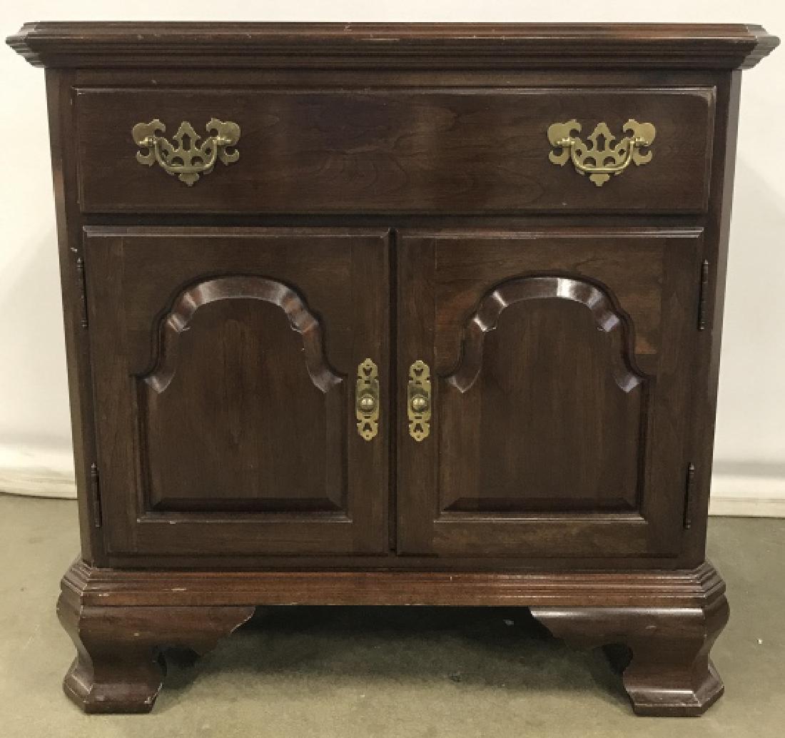 Vintage Ethan Allen Side Table: Vintage Ethan Allen Side Table In dark toned wooden finish, One drawer and lower cabinet with brass toned metal drawer pulls and hardware, marks to top and sides, interior of top drawer is marked with