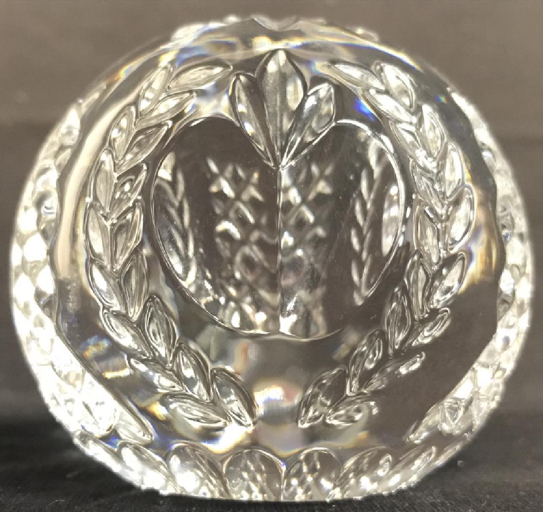 WATERFORD TIMES SQUARE 2001 Crystal Paperweight: Piece is cut crystal. Underside is marked WATERFORD TIMES SQUARE 2001. Paperweight has apple and geometric detail. Measures approx 3 inches tall and wide. tableware, bowl, centerpiece, cut crystal, lu