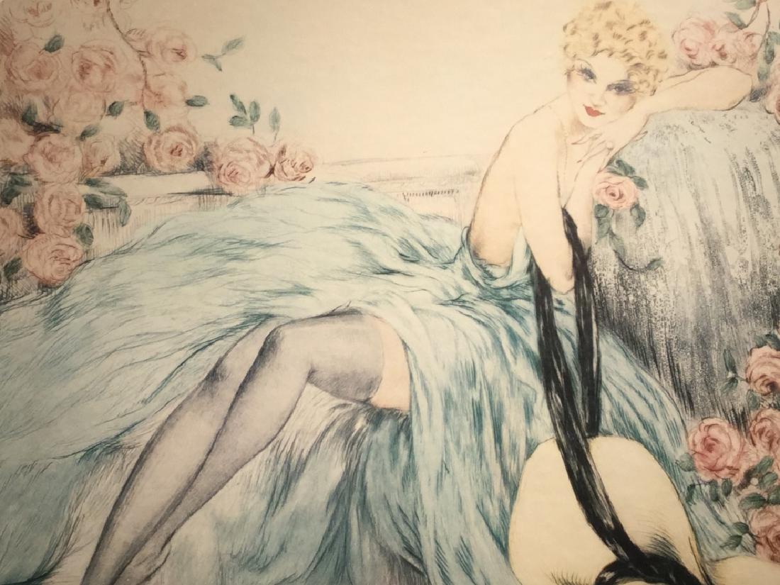 Framed ICART ‘La Belle Rose’ Poster Print: Framed Louis ICART Poster Print titled ‘La Belle Rose,’ depicting a woman in a blue gown lounging in a garden. Artwork is in a silver tone metallic frame. Frame has some scratches. Approximately 2