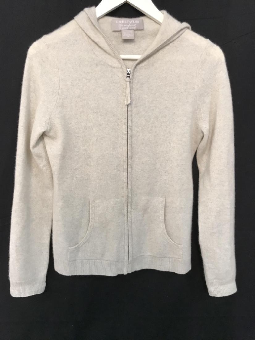 Lord & Taylor Women’s Cashmere Zip Up Sweater: Lord and Taylor Designer women’s casual cashmere zip up and hooded sweater. Sweater is pale oatmeal in tone. Label reads Lord & Taylor, the Weekend Collection, 100% cashmere, Size S Petite. Women’