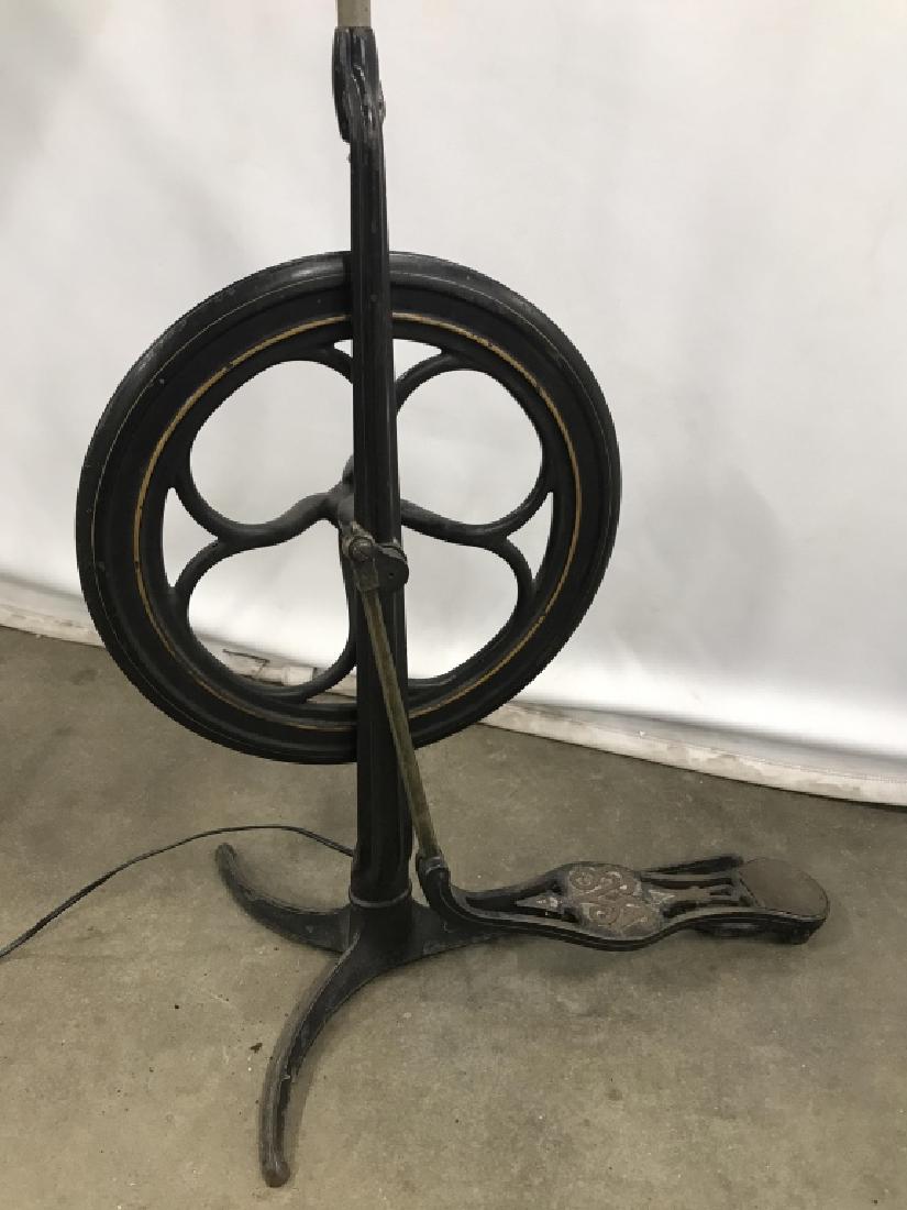 Architectural Salvage Repurposed Floor Lamp: Architectural Salvage Re Purposed Floor Lamp. Lamp has a foot pedal and wheel base possibly from a vintage sewing machine and additional mechanical parts extending from finial area with black toned sh