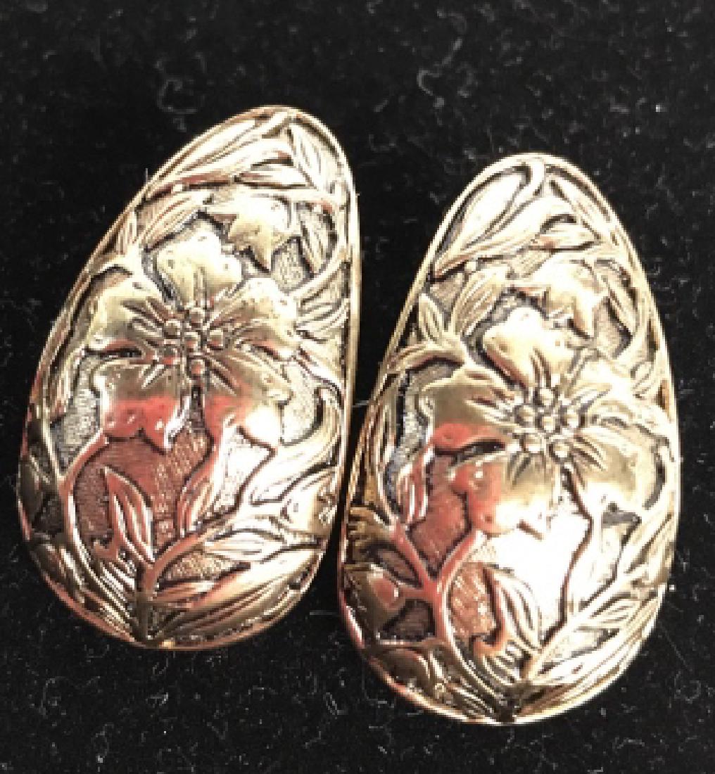 Pair of Art Nouveau Clip On Earrings: Silver and gold toned metal with sinuous lines vines and florals in relief, art nouveau, beaux arts, jewelry, Estate jewelry, each measures app 1.5 inches