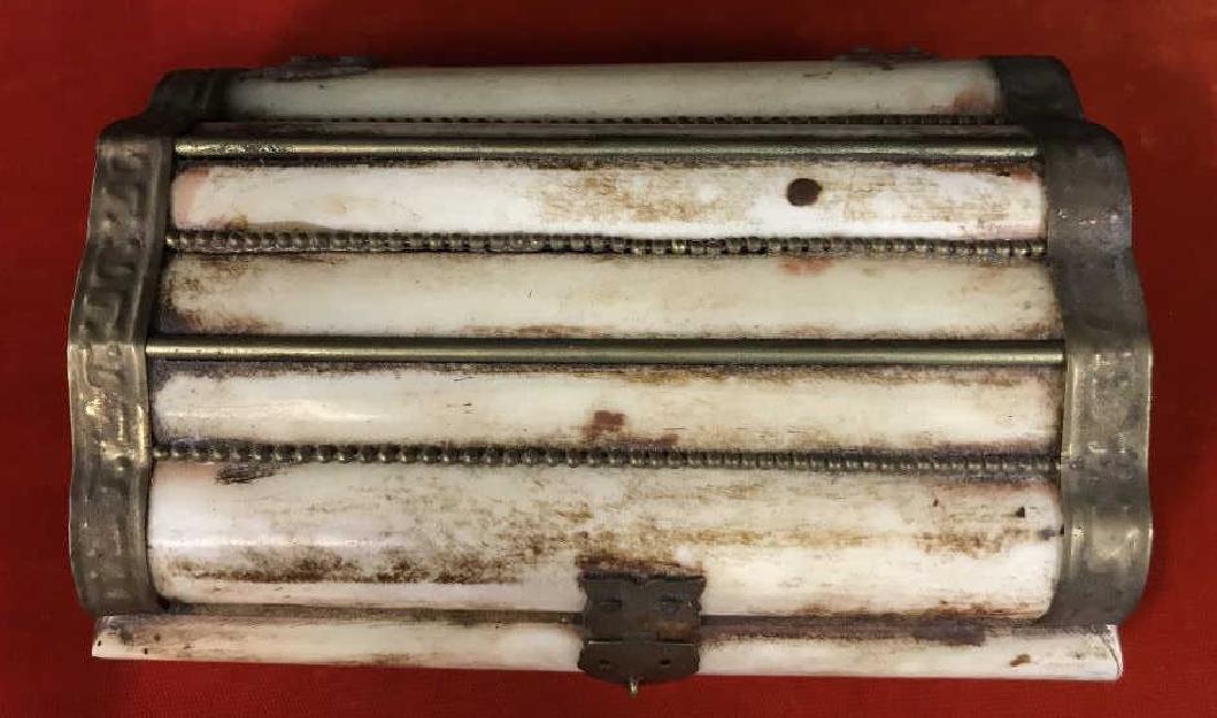 Vintage Bone and Brass Keepsake Box: Vintage, possibly antique, Bone and brass keepsake / trinket / souvenir box. Box is made up of panels of bone with brass hardware. Some surface wear consistent with age. Interior is lined with soft fa