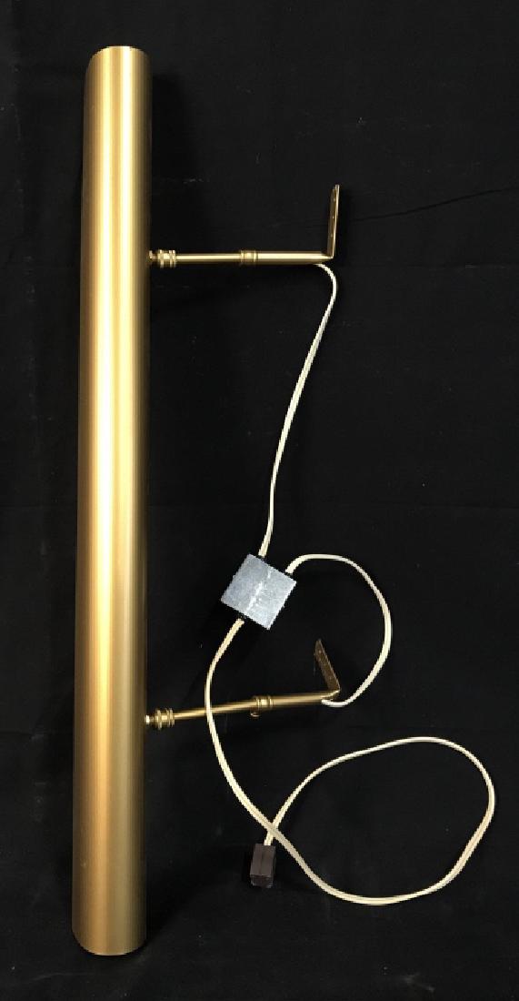 House Of Troy Wall Mounted Art Display Lighting: House Of Troy Wall Mounted Art Display Lighting In brushed brass toned metal finish, not tested, measures approximately 30 inches long x 10 inches deep, minor scratches to surface. Picture Display Lig