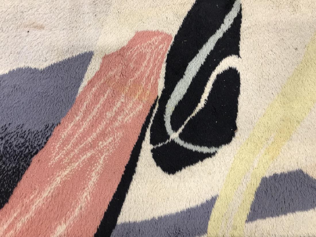 PERFECTIONS BY EGE Handmade Retro Area Rug: Rug is handmade. Possibly wool, possibly cotton. Contains tones of black, grey, cream, pink, & yellow. Rug has tag which reads PERFECTIONS BY EGE Made In Denmark. Has some wear & stains. Needs cleanin