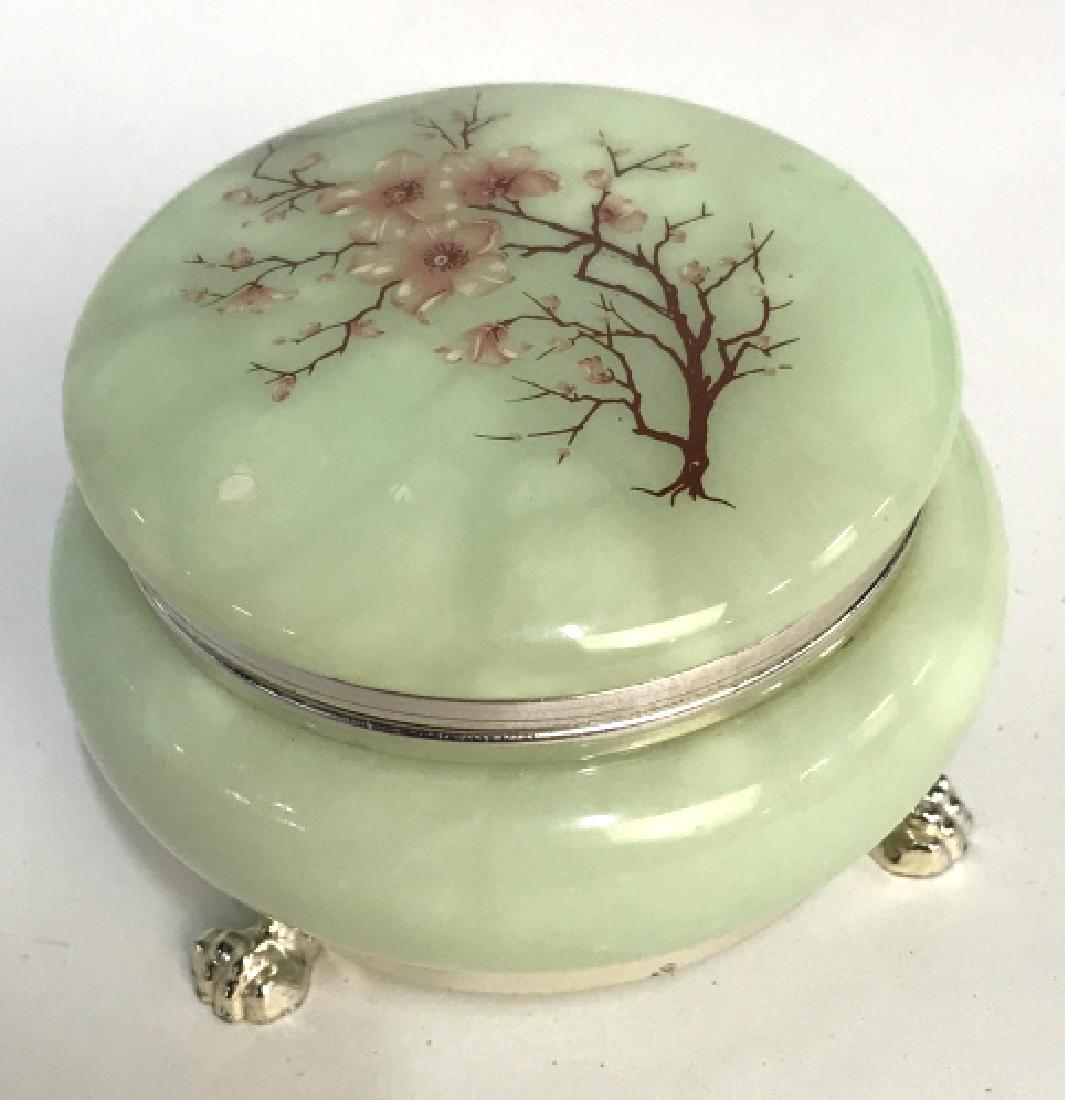 Vintage Italian Hand Carved Alabaster Trinket Box: Vintage Italian Hand Carved alabaster trinket Box with floral branch motif on lid. Box is pastel green in tone with silver tone hardware and sits on a 3 claw foot base. Box measures approx 2.5 inches 