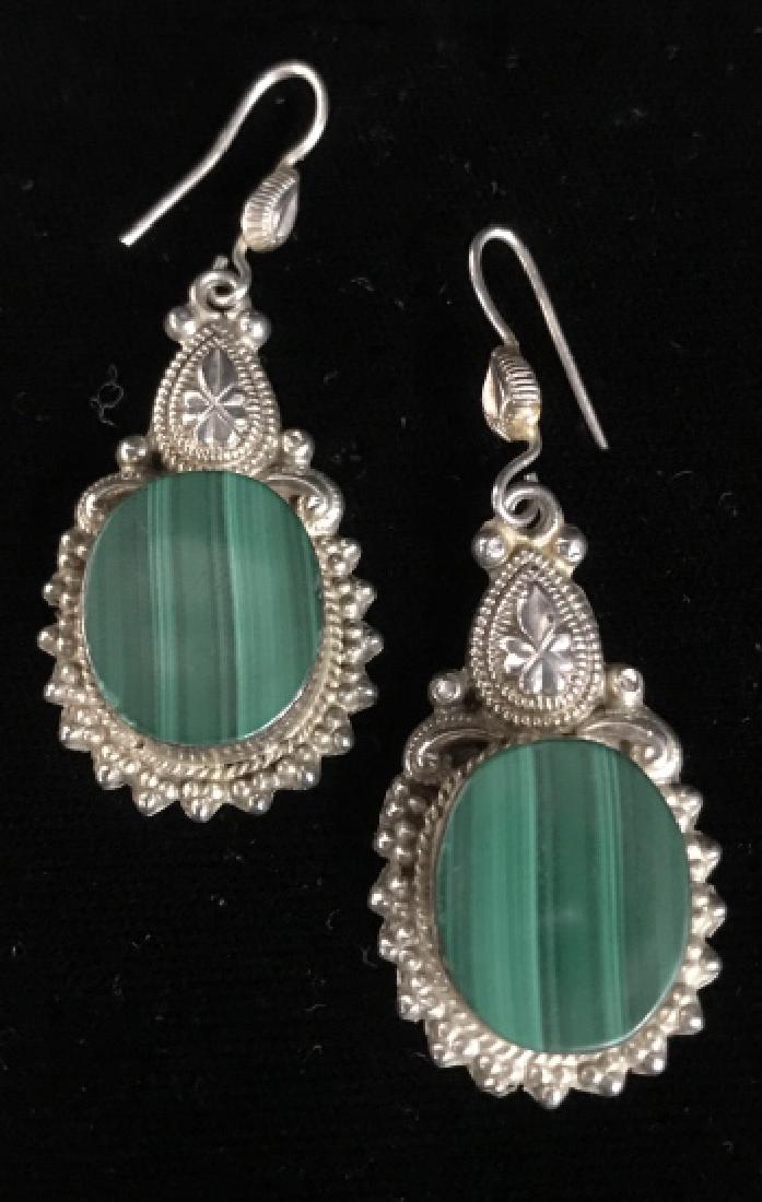 Malachite And Silver Toned Drop Earrings: Malachite And Silver Toned Drop Earrings, Possibly Sterling as marked with backwards 925 on reverse, drop measures approx 2 inches x .75 inches wide, no condition issues noted. Estate Jewelry, Stateme