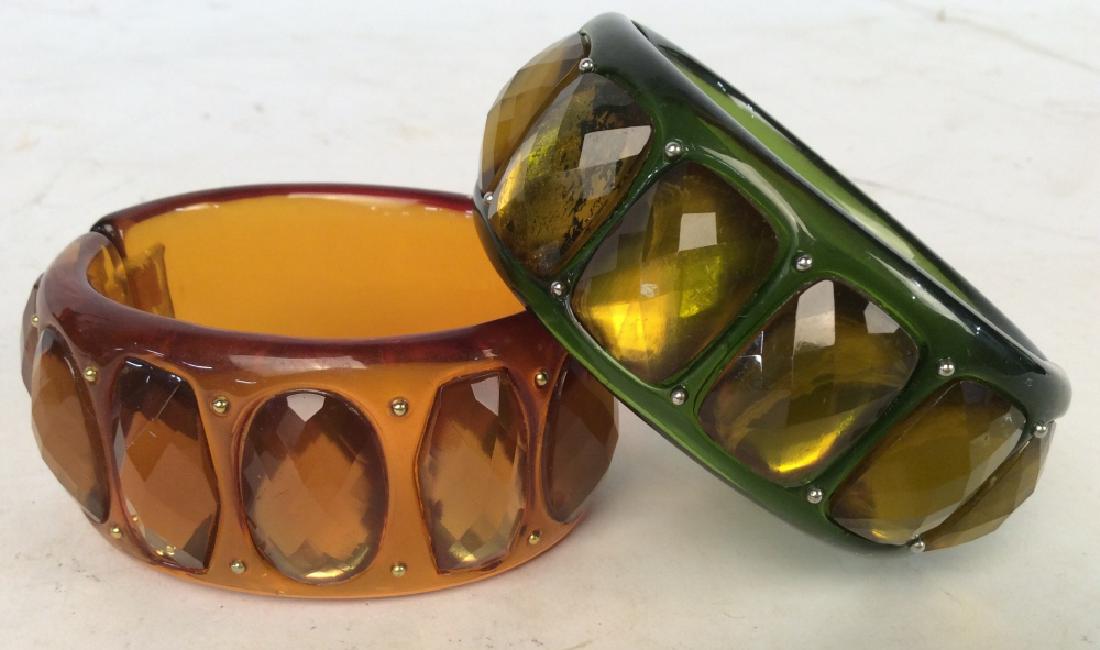 Pair Vintage Bangle Bracelets: Pair Vintage Bangle Bracelets, interior diameter 2 1/2 in width of bangles 1 5/8 in edge to edge, well made, good condition, one amber colored with simulated mixed cut Citrines, the other moss green a