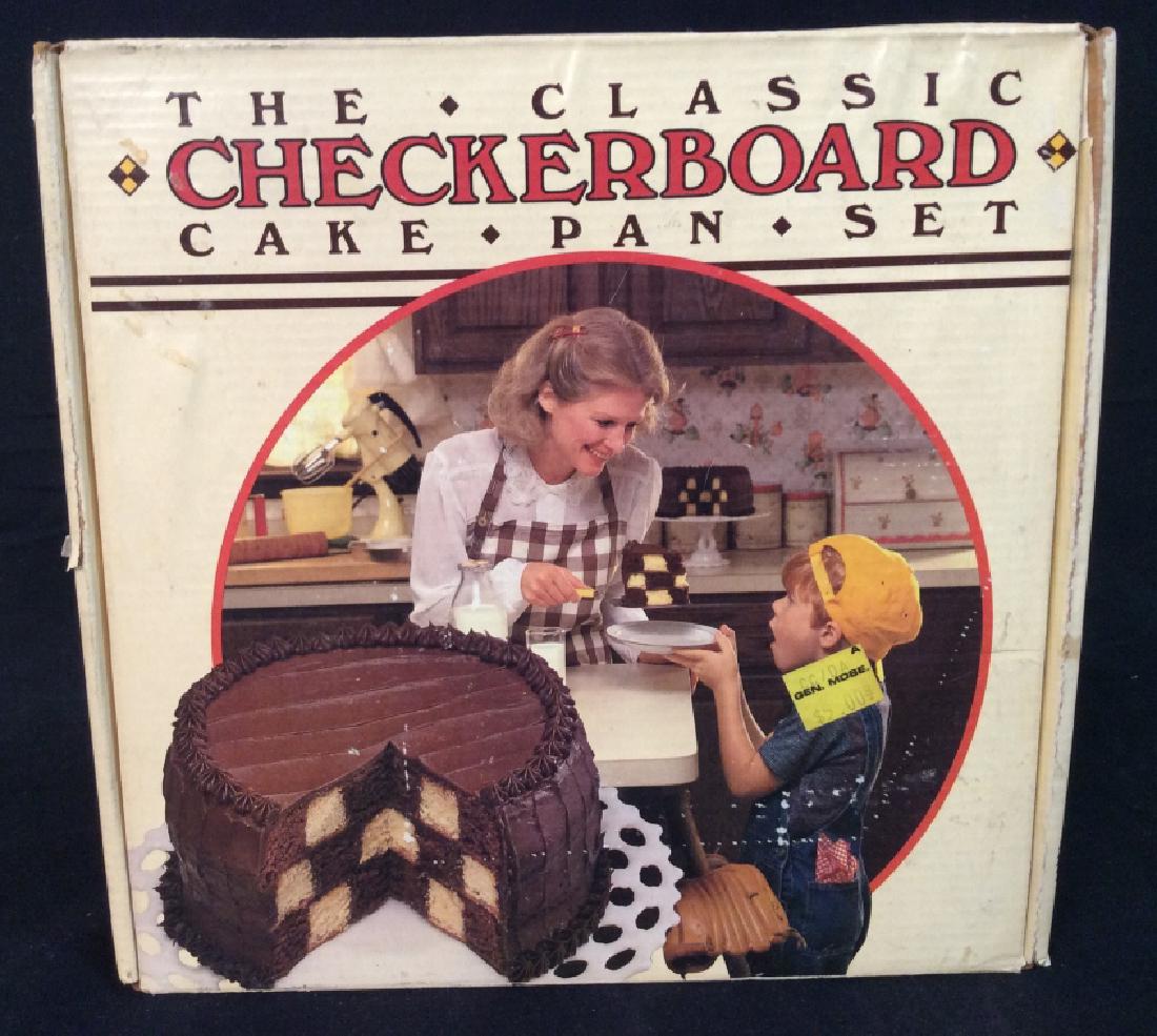 Vintage Classic Checkerboard Cake Pan Set: Vintage Classic Checkerboard Cake Pan Set, in original box, 9 1/2 x 9 1/2 in, used condition, manufactured by CM products Lake Zurich, Illinois, includes 3 - 9 in pans, divider, recipe & Instructions,