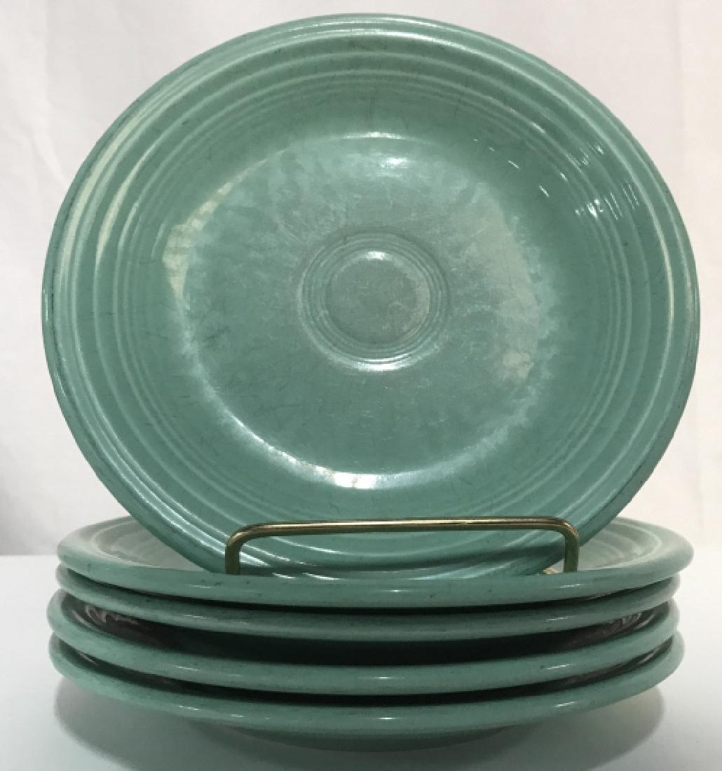 Set 5 Collectible Vintage Fiestaware Plates: Set 5. collectible vintage fiestaware starter / appetizer / salad / dessert / bread and butter plates. Plates are pastel green in tone. Undersides are marked for Fiesta collection. All plates have mod