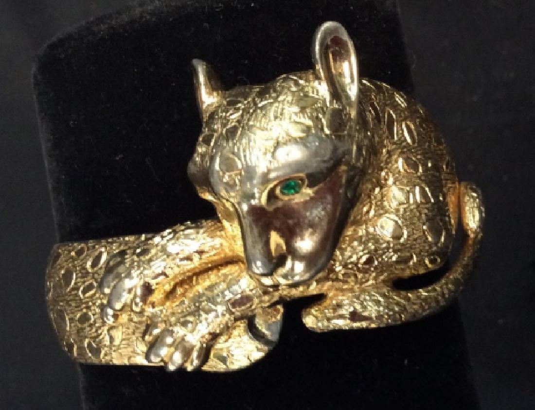 Signed Wide Panther Form Cuff Bracelet: Signed illegibly, possibly Castle, Vintage jewelry, panther form gold toned bracelet, opens closes w Hinge, green glass eyes, statement piece, estate jewelry, signed by designer cuff width app .75 to 