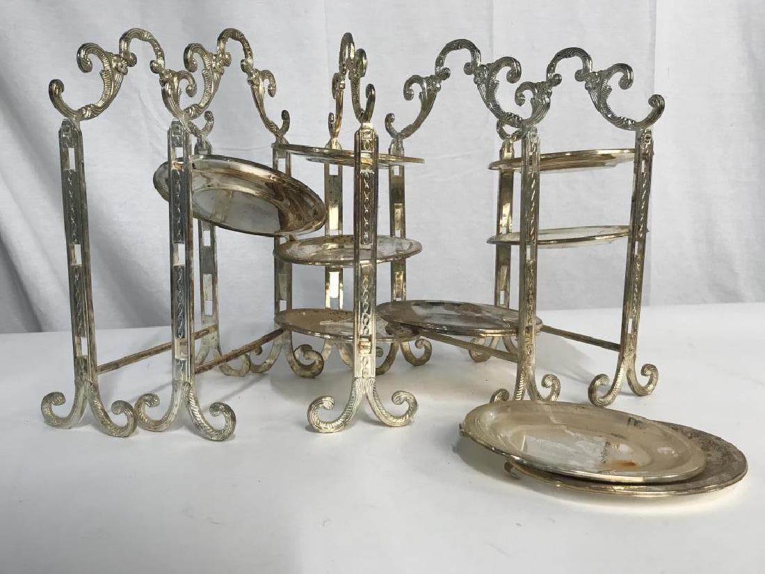 Set 5 Silver Plated Tiered High Tea Serving Trays: Set of 5 silver plated tiered high tea serving trays. Trays have moderate discoloration from metal corrosion. Some trays are detached from stands and multiple are missing. Pieces will need polishing /