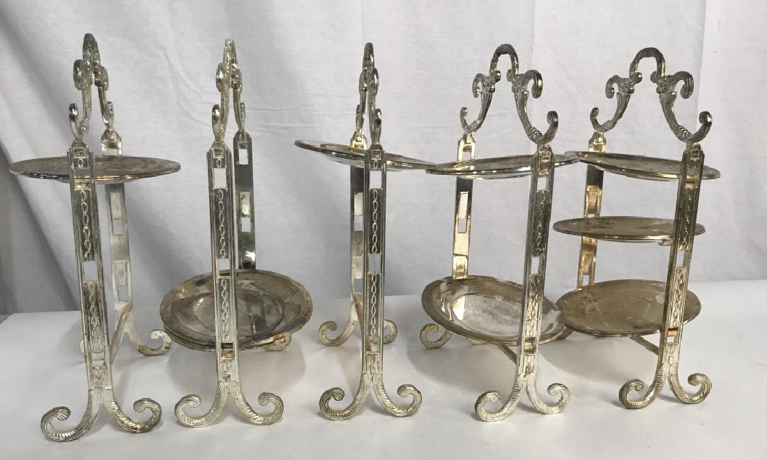 Set 5 Silver Plated Tiered High Tea Serving Trays: Set of 5 silver plated tiered high tea serving trays. Trays have moderate discoloration from metal corrosion. Some trays are detached from stands and multiple are missing. Pieces will need polishing /