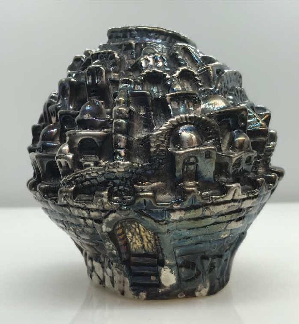 Iridescent Frank Meisler Style Jerusalem Figurine: Possibly sterling silver, marked in relief 925, metallic skin over a core of some other material. Possibly sterling silver, possibly later reproduction of different material. Iridescent Jerusalem pape