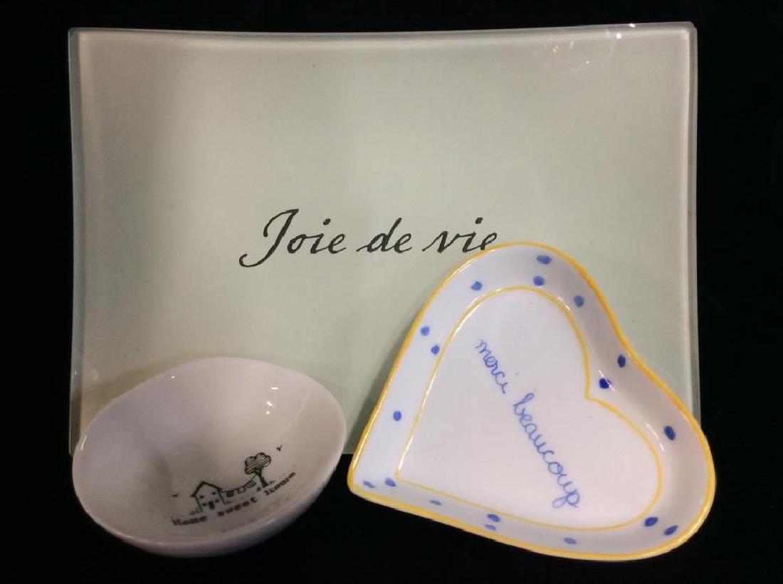 Lot 3 Glass and Porcelain Trinket Dishes: Lot 3 Glass and Porcelain Trinket Dishes, one handpainted Heart Dish, one EAST OF INDIA miniature bowl with whimsical interior illustration, and one BENS GARDEB signed handcrafted decoupage dish, larg