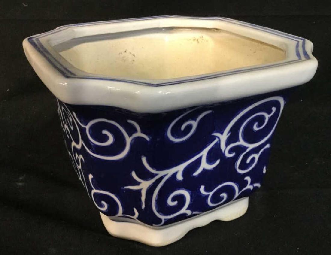 Blue and White Ceramic Planter: Blue and white ceramic planter, Cache Pot. Measures approx 7.25 inches by 7 inches in length and width, 5 inches in height. Outdoor garden accessory. Tabletop accessory, tableware, Home Decor, Home ac