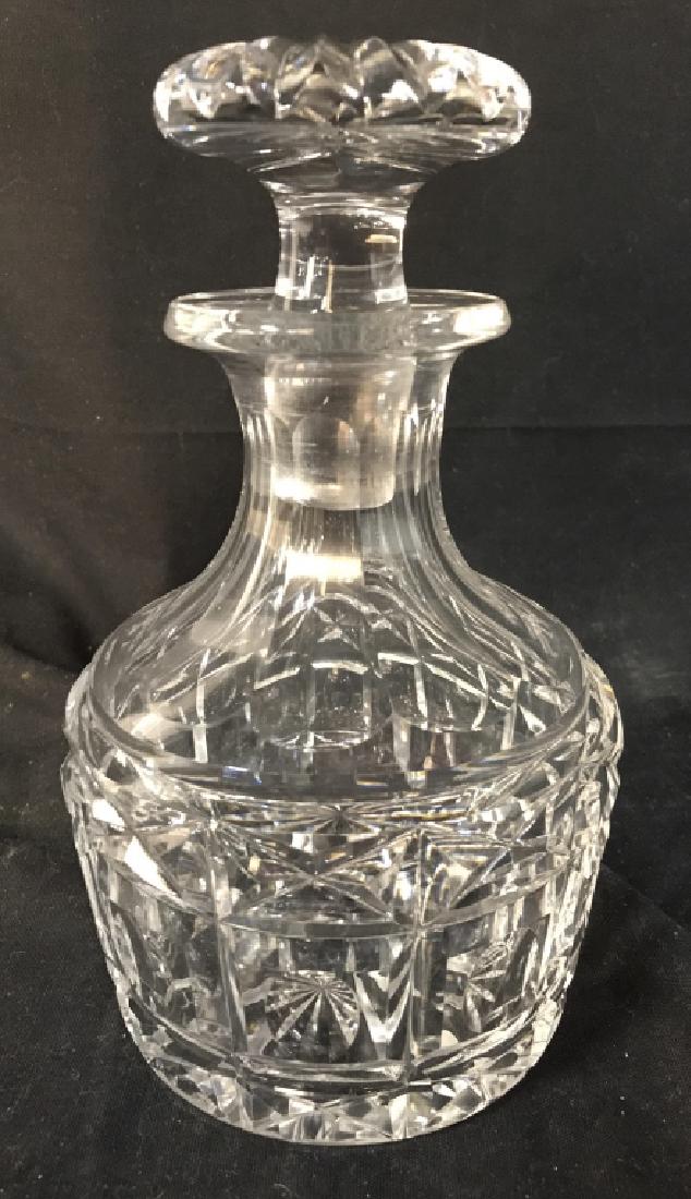 Cut Crystal Decanter W Stopper: Decanter is Cut Crystal. Decanter includes stopper. Measures approx 8 inches tall 5 inches wide. No condition issues noted. Barware, crystal decanter, drinking accessory, tableware 6