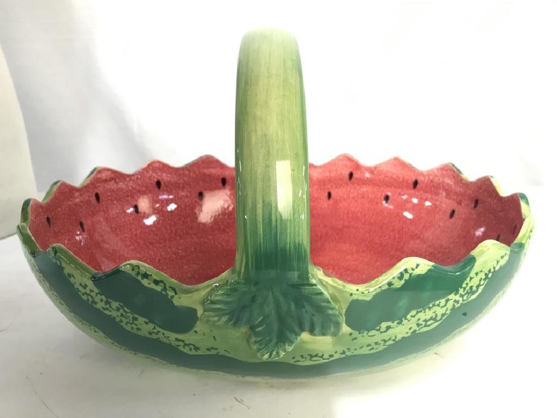 Porcelain Handled Watermelon Dish: Dish is shaped and painted like a watermelon. Center of piece has handle. Measures approx 12 inches long 7 inches tall. tableware, tabletop accessory, decor piece, decorative accessory. centerpiece, s