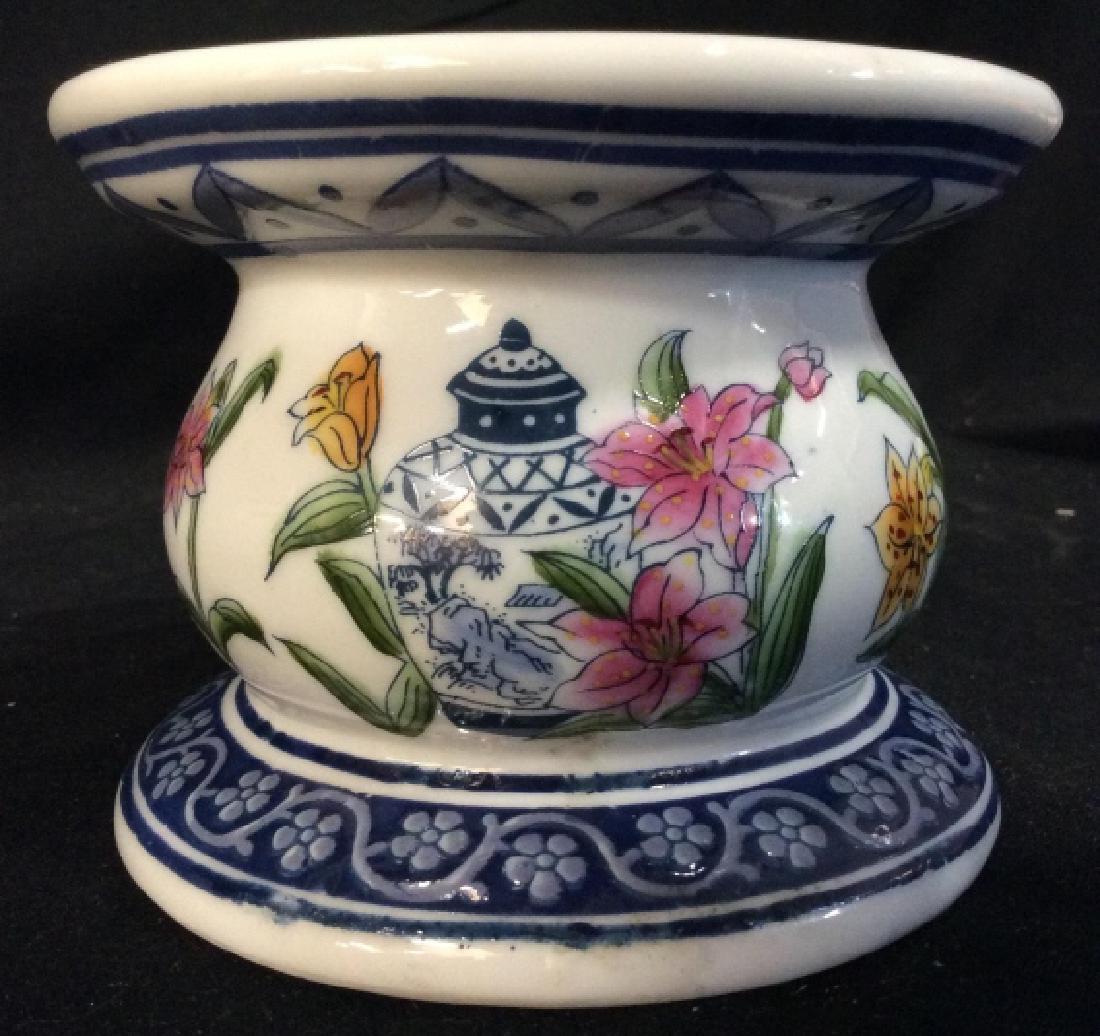 Asian Style White Toned Porcelain Dish Stand: Asian Style White Toned Porcelain Dish Stand, with blue toned floral trim and center illustrative design of Asian vase with flowers. Cake stand, dish pedestal, decorative accessory, tableware, measure