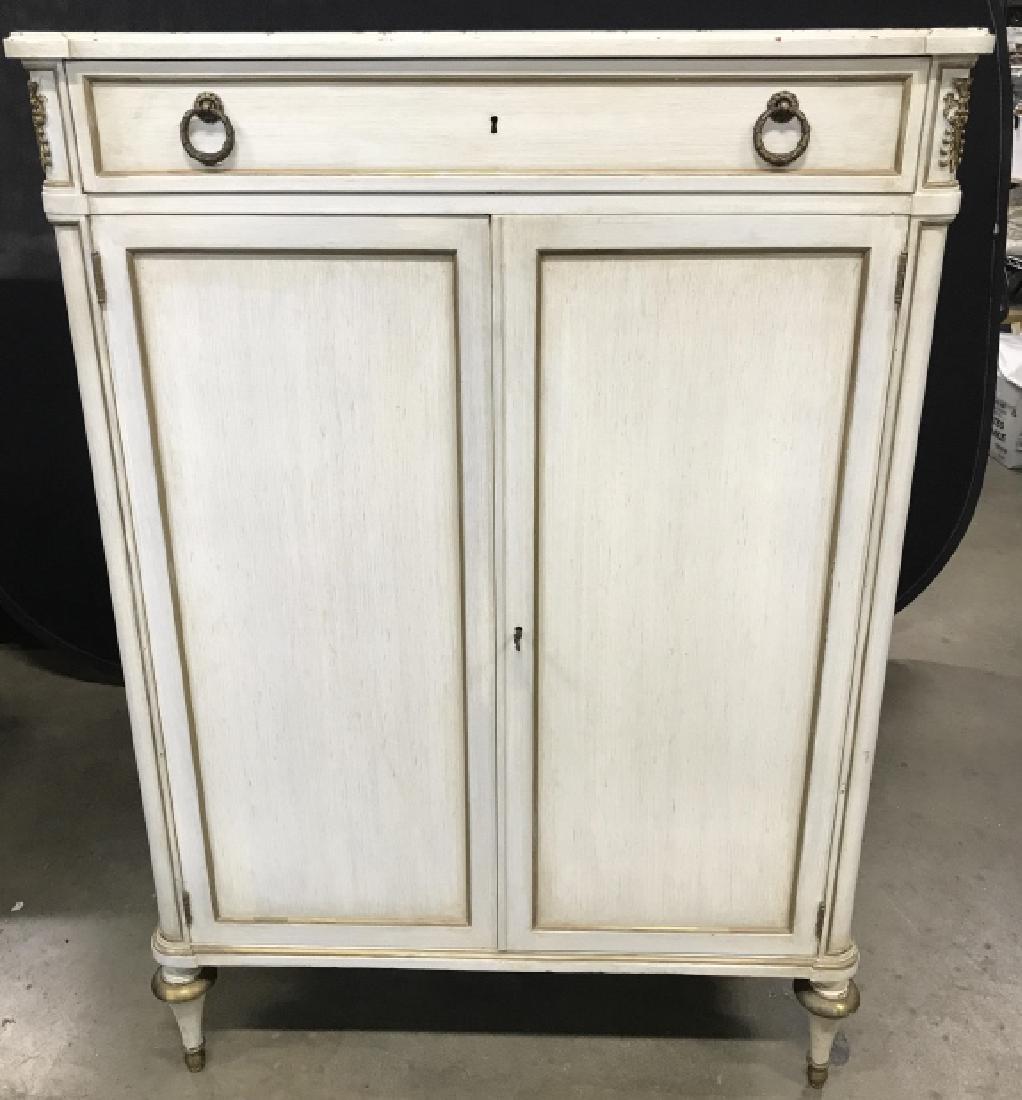 Country French Style Chest W Ormolu Mounts: Country French Style Tall Chest With Ormolu Mounts And gilt trim, slender top drawer with brass toned drop pulls, two doors open to reveal four pull out drawers for storage, includes key for door, som