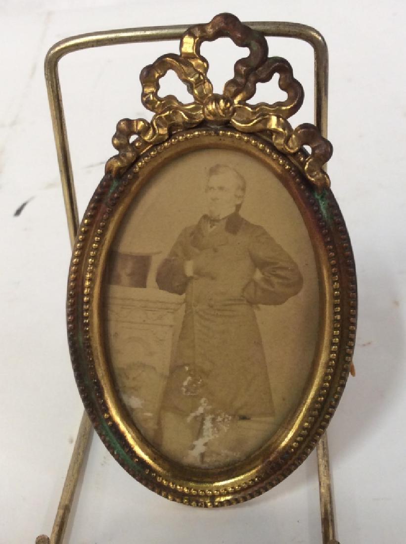 Antique Gilt Picture Frame with Photo: Antique Gilt Picture Frame with Photo, 2 3/4 x 4 1/2 in, chipping, glass coming from frame, photo possibly a daguerreotype, Portrait Of a man, Collectible Photography, Picture Frames, Miniature Frames