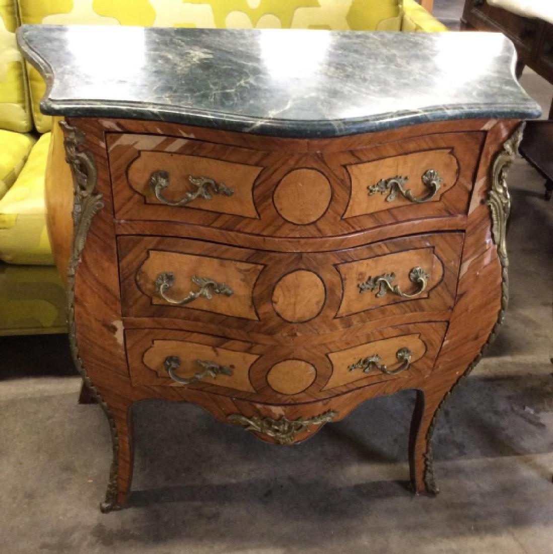 Vintage Marble top Dresser: Green marble top Cabriole leg ormolu trim and hardware inlay wood on sides and drawers handles and feet, continental European style three drawer table. Some moderate damage to wood finish, crack in si