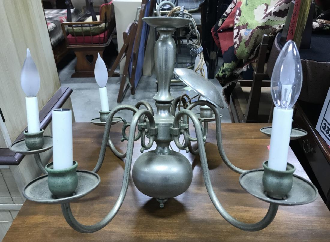 Vintage Metal 6 Arm Chandelier: Chandelier has 6 arms. Is silver toned measures approx 23 inches tall, 22 inches wide. One bulb is missing. Home Lighting. Dining room lighting. Hanging Ceiling Lights. Chandelier.