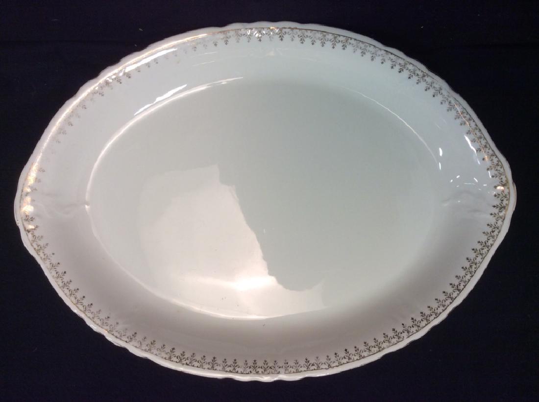 EDWIN M. KNOWLES Fine China Serving Platter: EDWIN M. KNOWLES semi vitreous serving platter / dish. Platter has gold tone floral / fleur de lis motif pattern along rim. Moderate fading of gold tone. Underside is marked wit( Edwin M. Knowles Trad