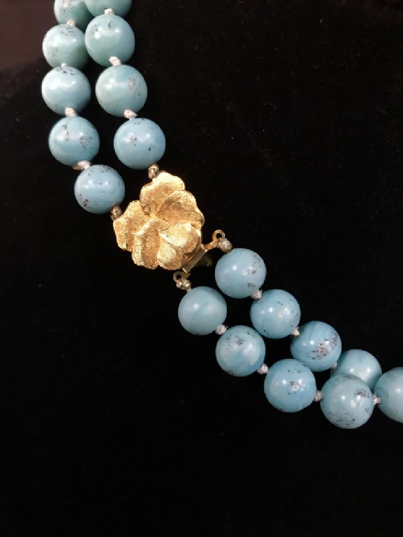 Joseph Mazer Turquoise Toned Beaded Necklace: Joseph Mazer Turquoise Toned Double Strand Beaded Necklace with Gold Toned Metal Floral Clasp, Measures approx 16.5 inches long x 7/8 inches wide, marked on clasp Joseph Mazer, no condition issues not