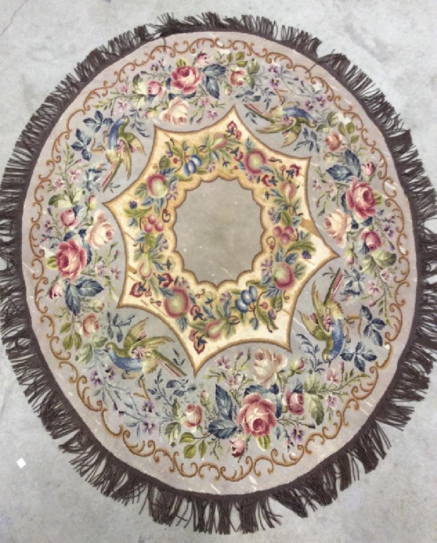 1910 Needle Point Table Rug, Piano Throw: Table carpet, piano throw rug, antique C 1910, oval shaped long needlepoint, long fringe, silk back, birds florals, vines swirls and more, Victorian Pattern, with fringe measures app 63 by 52 inches t