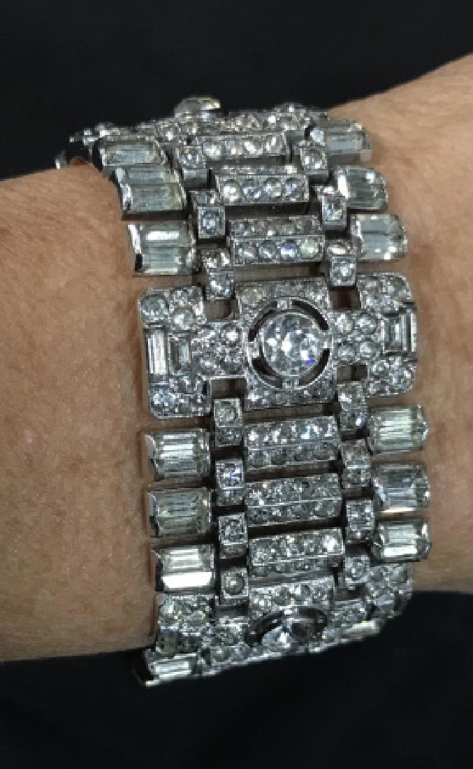 TRIFARI Signed Art Deco Rhinestone Bracelet Jewelry: Estate jewelry, vintage jewelry, wide bracelet, fashion accessory, wearable fashion signed Trifari on clasp with small crown figural above T, width of bracelet 1.25 inches length app 7 inches