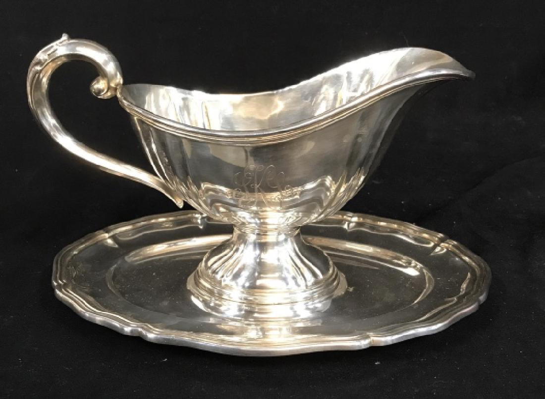 ALPACCA Silver Toned Gravy Boat w Under Plate: Marked and trademarked ALPACCA, measures ht app 6.5 inches length app 10 inches, tableware, tabletop accessory, gravy boat engraved initials monogram possibly SKL.