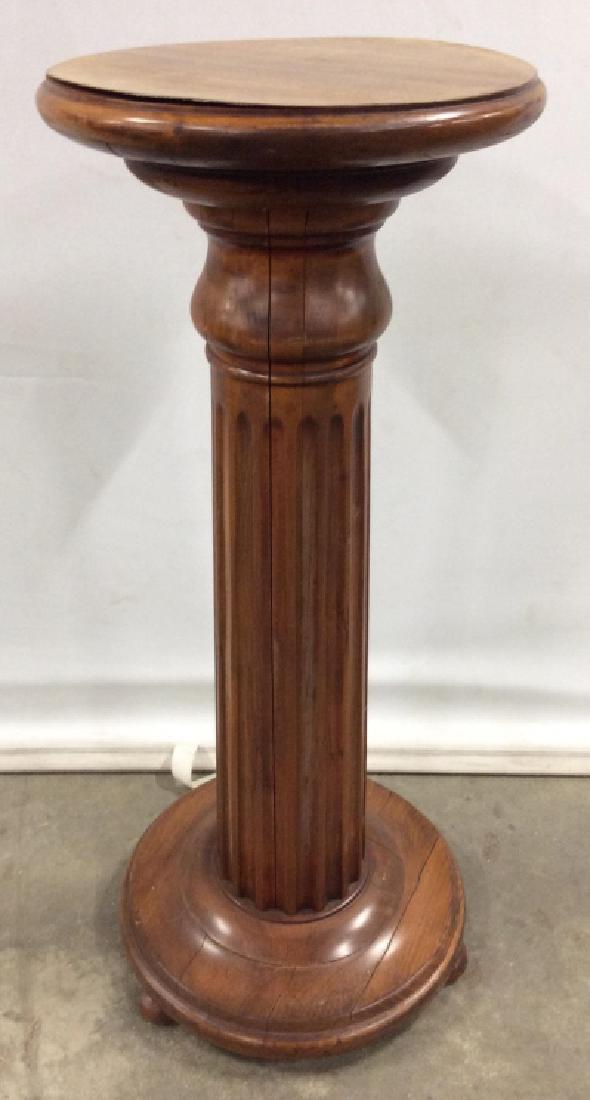 Carved Wooden Pedestal: Pedestal is wooden. Piece has shape resembling pillar. Measures approx 31 inches tall 13 inches wide. Contains some cracks. pedestal base, plant / sculpture display stand 6.
