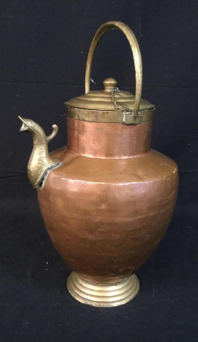 Brass and Copper Bird Spout Vessel: Pedestal footed vessel, jug, Lidded Pitcher, up cycle vase, decorative accessory, hand crafted, decorative arts, copper and brass ht app 18 inches to handle diameter spout to rim app 10 inches