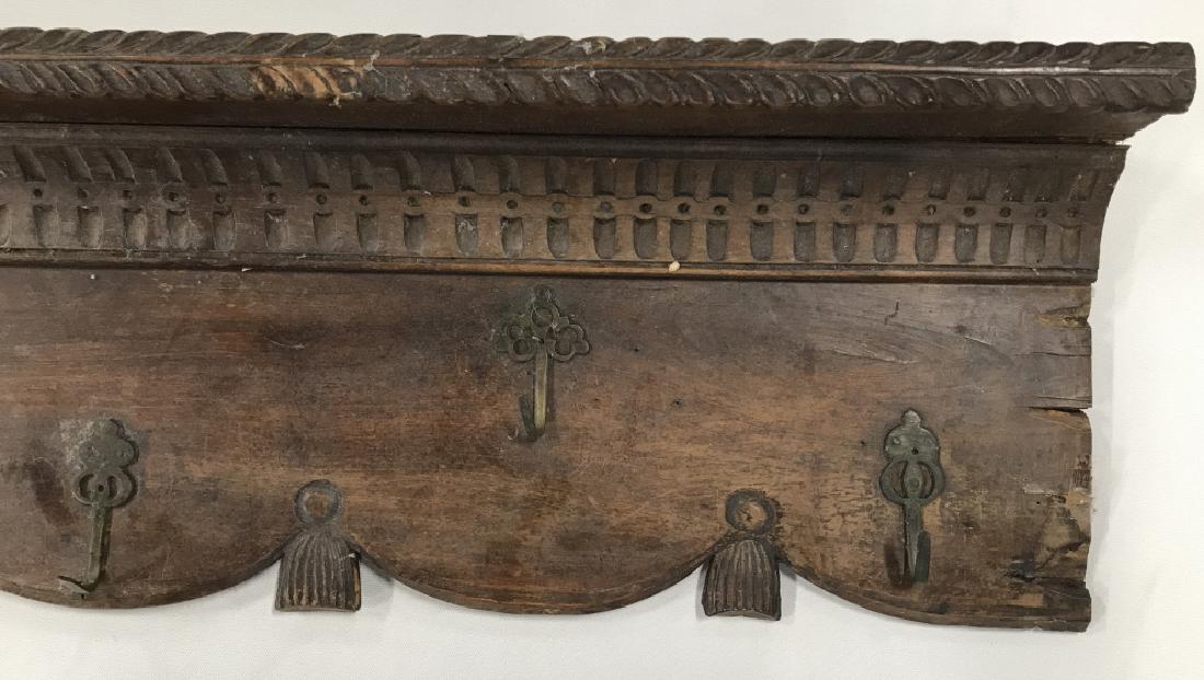 Vintage Antique Wall Mounted Coat Rack: Vintage Antique Wall Mounted Coat Rack with 11 brass toned metal hooks, carved Cornice and top shelf, sides need reattaching, piece missing on lower right side, a few cracks due to age and some surfac